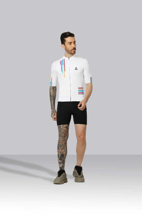 Cyclist wearing the Ultra Randonneurs Race-Fit Cycling Jersey with YKK zipper, silicone hem, and three rear pockets.