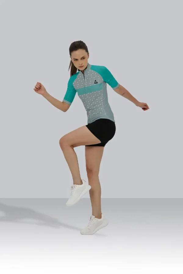 Cyclist wearing Pistachio Dream Branded Cycling Jersey with race-fit design, breathable DRI-FIT fabric, and YKK zipper.