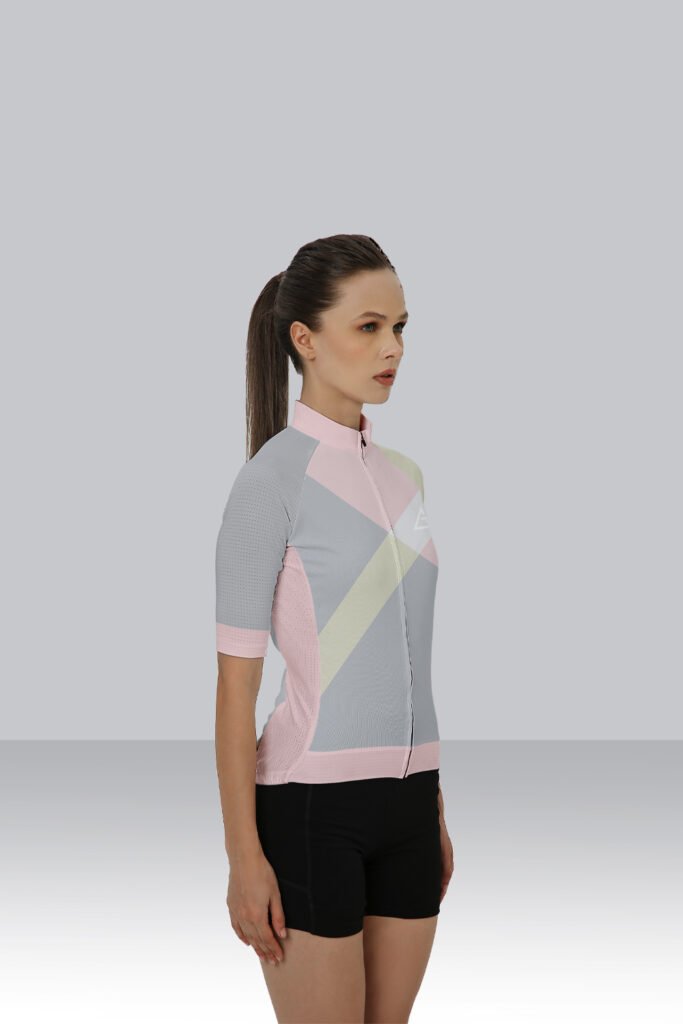 Cyclist wearing SwiftMotion Race Fit Cycling Jersey on a road ride.