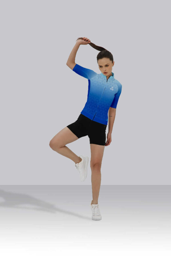 Cyclist wearing Blue Hexa Cycling Jersey with race-fit design, hexagonal pattern, and premium breathable fabric.