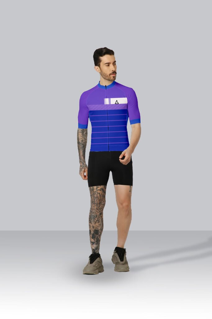 Cyclist wearing Velocity Pro Race Fit Cycling Jersey during a high-speed ride.