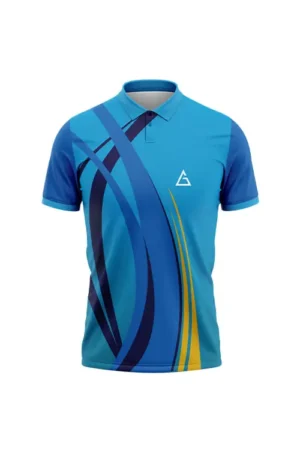 Shuttle Storm Premium Badminton Jersey front side featuring shades of blue with dynamic navy and yellow arc patterns, a teal collar, short sleeves, and a white chest logo.
