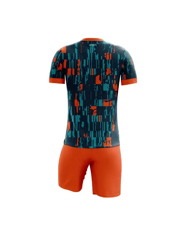 Back view of modern graphic sublimation football kit with teal and orange abstract pattern, orange shorts, lightweight polyester fabric, antibacterial treated, durable and vibrant colors.