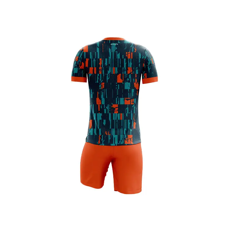 Back view of modern graphic sublimation football kit with teal and orange abstract pattern, orange shorts, lightweight polyester fabric, antibacterial treated, durable and vibrant colors.